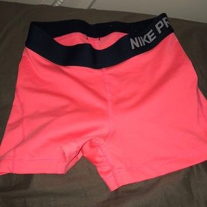 Neon pink nike pros